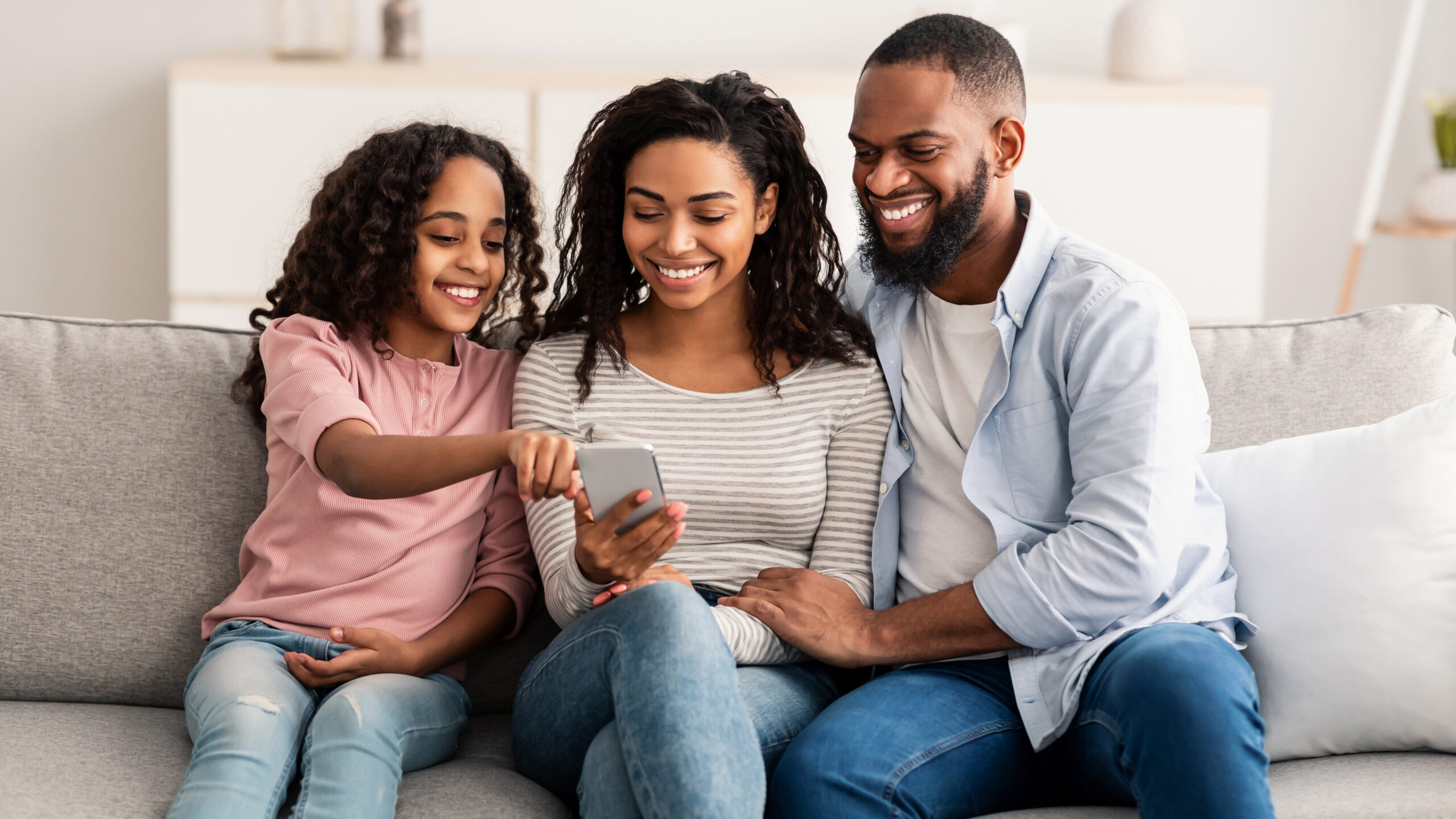 People,And,Technology.,Portrait,Of,Happy,African,American,Family,Holding